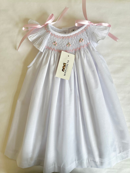 Vestido jesucito hecho a mano color blanco con bordado en tono de rosa para niña | CARPI