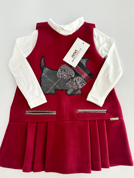 Jumper color tinto con estampado al frente de perrito para niña.