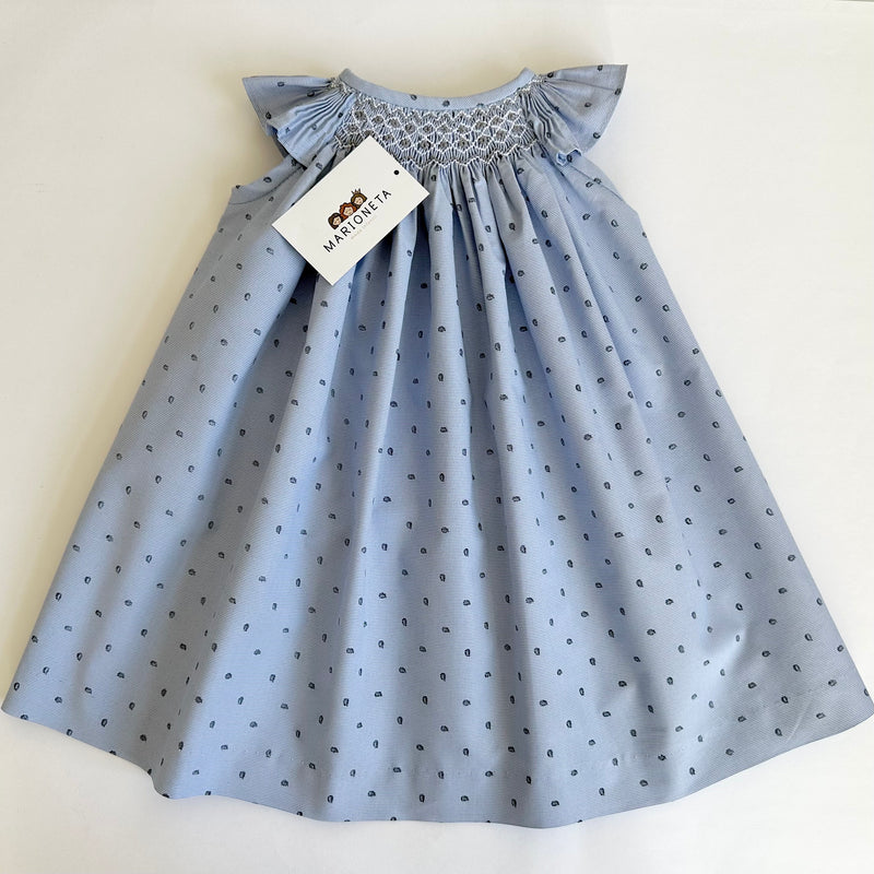 Vestido Jesuscito  bordado hecho a mano color azul estampado con hojitas marino para niña   |