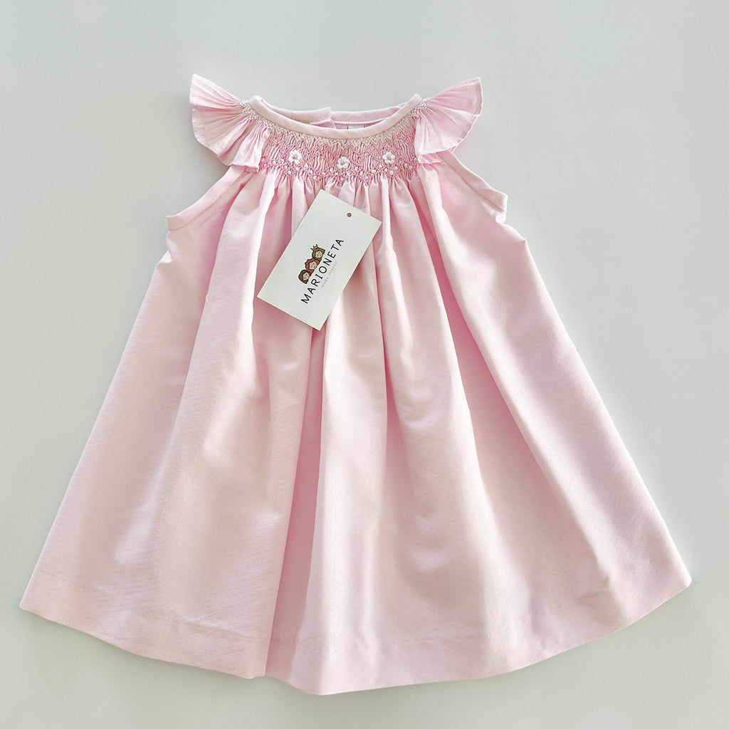 Vestido bordado hecho a mano jesucito color rosita con bordado blanco para bebe niña.