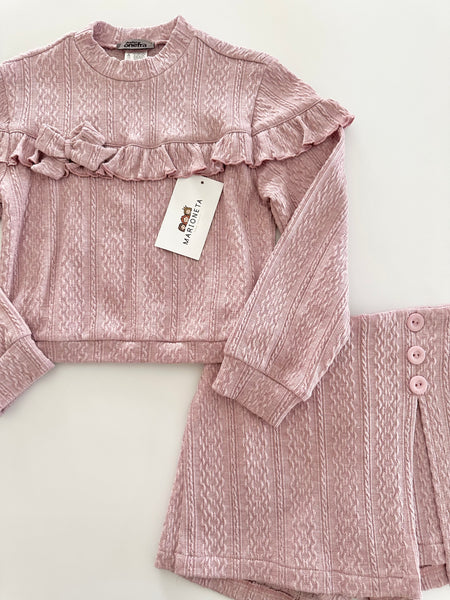 Conjunto dos piezas playera y falda short color rosa palo para niña.