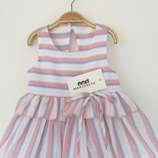 Vestido de rayas color rosa con blanco y azul con detalle de olan en la cintura para niña | MARCA MEXICANA