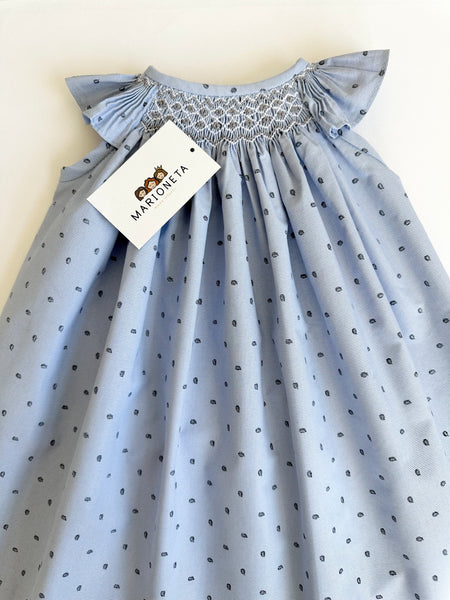 Vestido Jesuscito  bordado hecho a mano color azul estampado con hojitas marino para niña   |