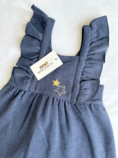 Jumpers marino con adorno de estrella y blusa blanca estampada de estrellas y volante al cuello para niña  Dadati