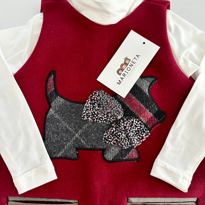 Jumper color tinto con estampado al frente de perrito para niña.