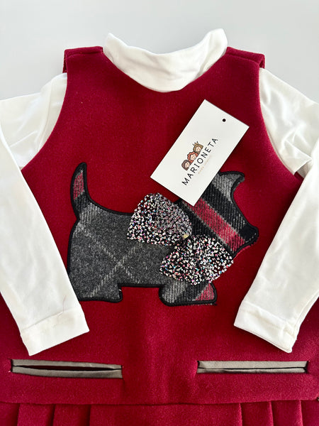 Jumper color tinto con estampado al frente de perrito para niña.