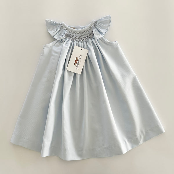 Vestido bordado hecho a mano jesucito color azul con bordado en color gris para bebe niña.