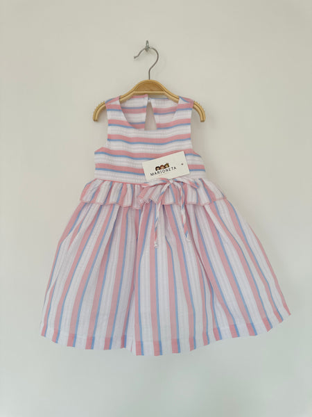 Vestido de rayas color rosa con blanco y azul con detalle de olan en la cintura para niña | MARCA MEXICANA