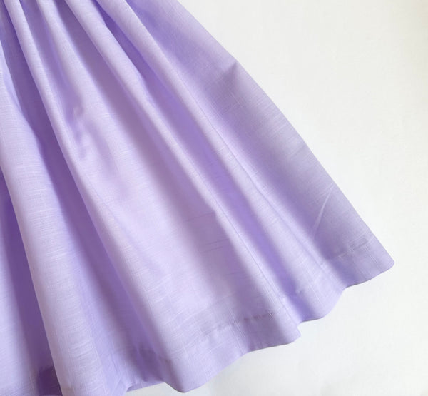 Vestido bordado hecho a mano color morado bajito para niña | CARPI