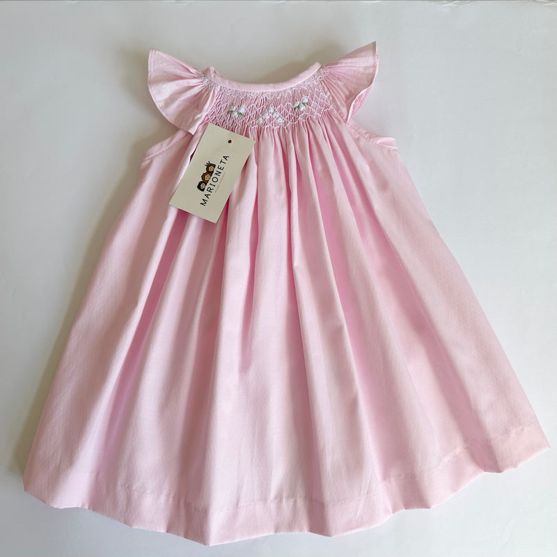 Vestido bordado hecho a mano jesucito color rosa con bordado blanco para niña