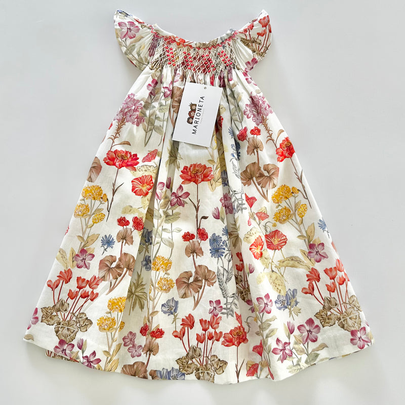 Vestido  jesucito bordado a mano floreado color naranja para niña |