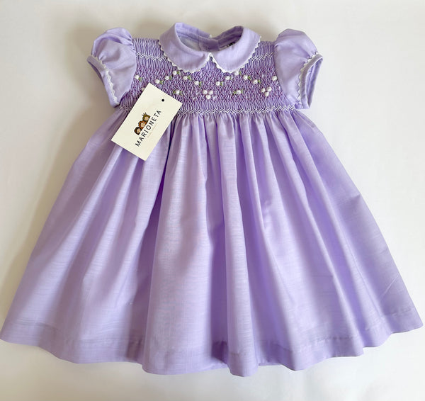 Vestido bordado hecho a mano color morado bajito para niña | CARPI