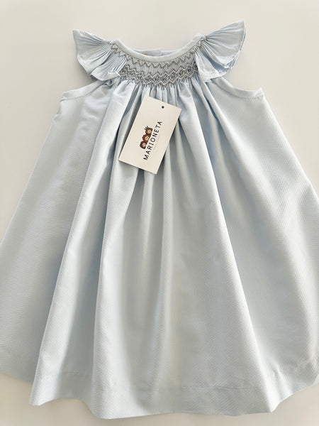 Vestido bordado hecho a mano jesucito color azul con bordado en color gris para bebe niña.