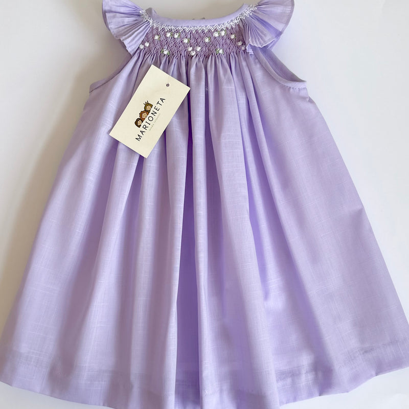 Vestido bordado jesucito hecho a mano color morado bajito para niña | CARPI