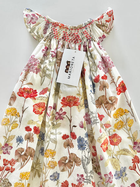 Vestido  jesucito bordado a mano floreado color naranja para niña |