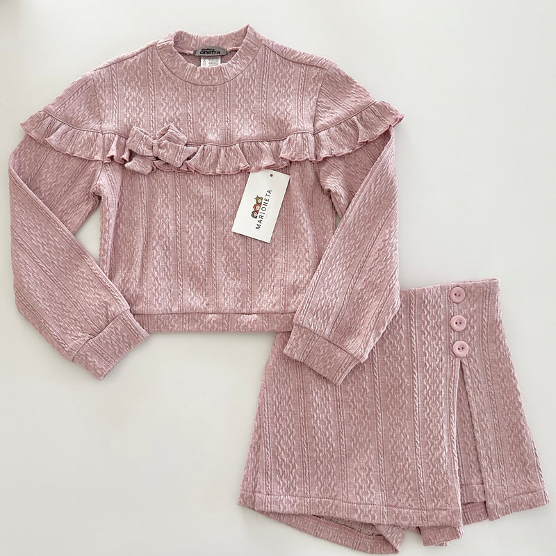Conjunto dos piezas playera y falda short color rosa palo para niña.