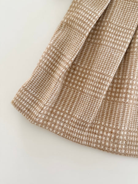 Vestido a cuadros color cafe claro con lazo al frente para niña |