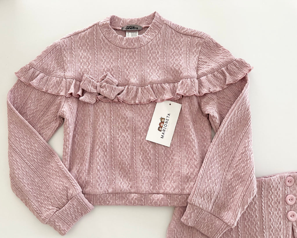 Conjunto dos piezas playera y falda short color rosa palo para niña.