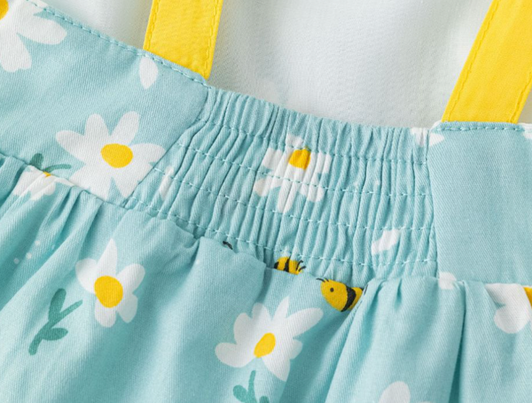 Vestido azul con estampado de flores  y lazos en los hombros para bebe niña | Newness