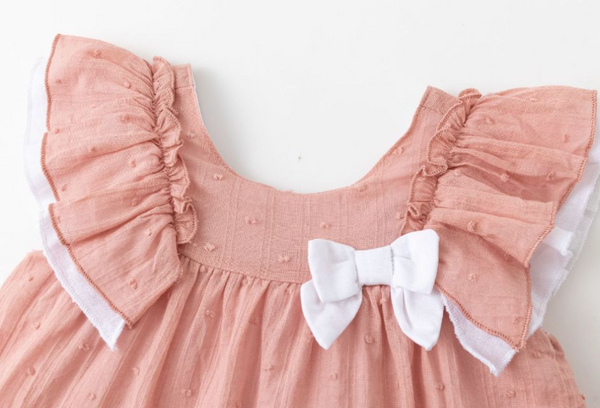 Vestido de fiesta de tirantes con braguita, color salmon  de plumeti 100% algodón, para bebe niña | NEWNESS