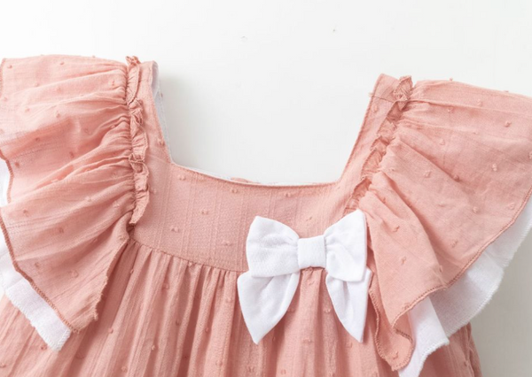 Vestido de fiesta color salmon con blanco de tirantes con lazo al frente para niña | NEWNESS