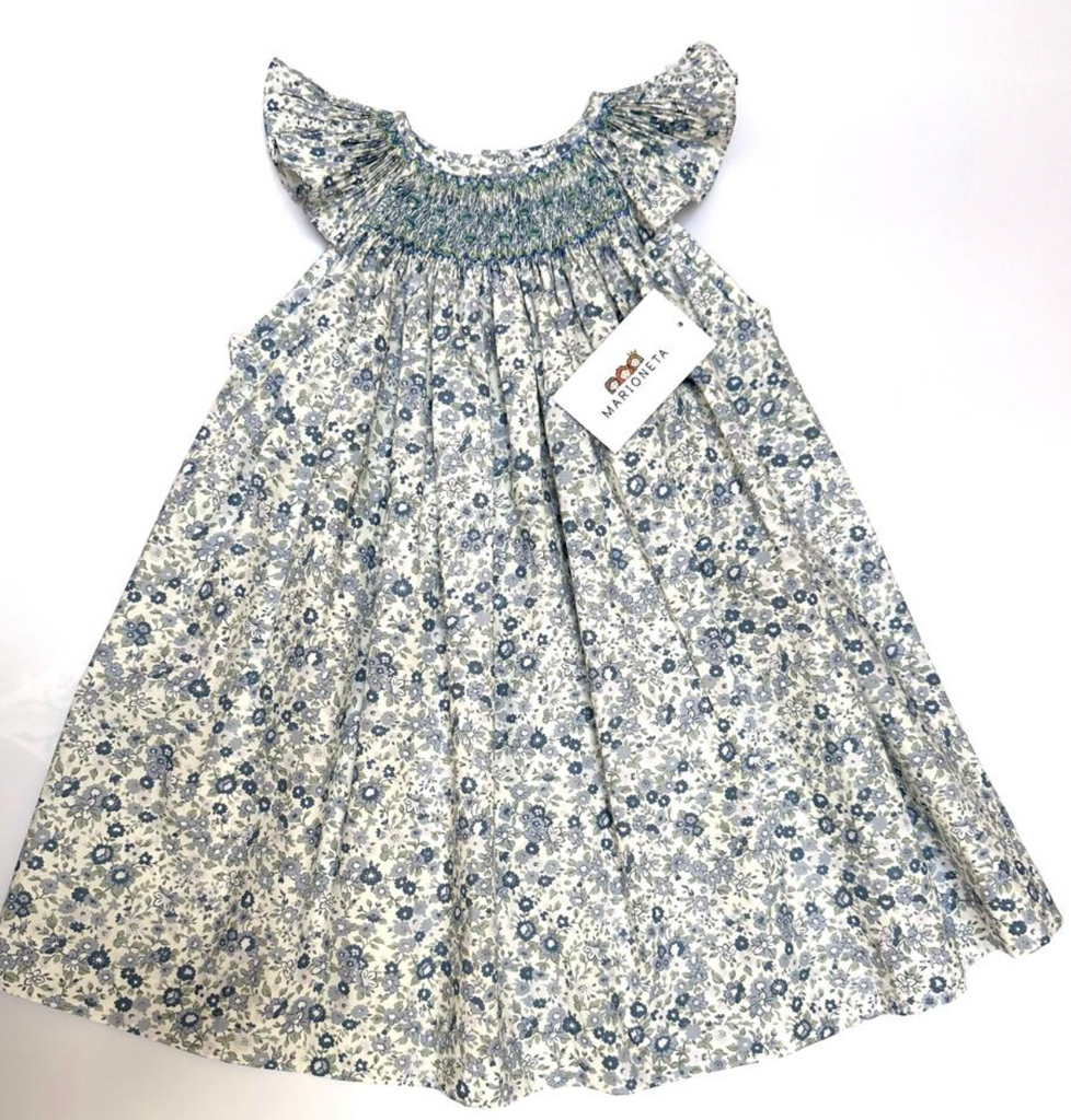Vestido Jesucito bordado hecho a mano color azul estampado de flores .|  CARPI