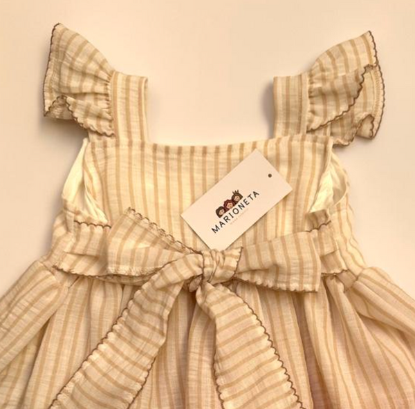 Conjunto dos piezas blusa perla con rayas y short salmon para niña .