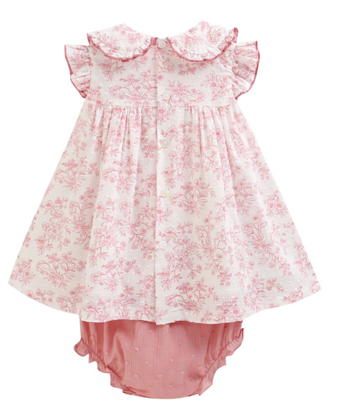 Vestido estamapado de florecitas colo rosita con lazo al frente y braguita para bebe niña. | NEWNESS