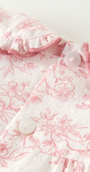 Vestido estamapado de florecitas colo rosita con lazo al frente y braguita para bebe niña. | NEWNESS