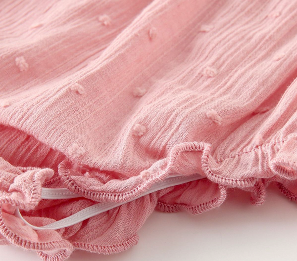 Vestido estamapado de florecitas colo rosita con lazo al frente y braguita para bebe niña. | NEWNESS