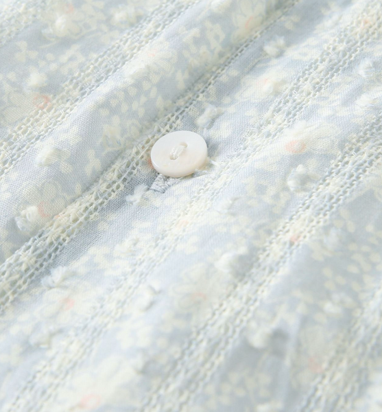 Vestido estampado color azul con rosita con lazo al frente y braguita en rosita para bebe niña | NEWNESS