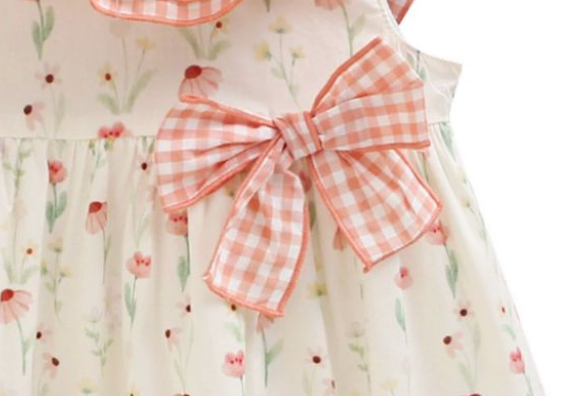 Vestido estampado color ivory con salmon  con lazo al frente para niña  | NEWNESS