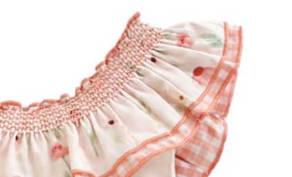 Vestido estampado color ivory con salmon  con lazo al frente para niña  | NEWNESS