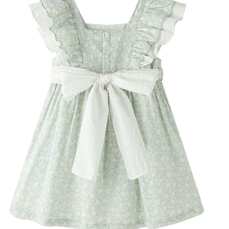 Vestido estampado color verde bajito con olanes en los hombros y lazo por la parte de atras para niña | NEWNESS