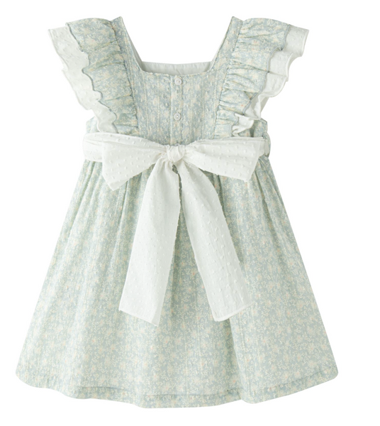 Vestido estampado color verde bajito con olanes en los hombros y lazo por la parte de atras para niña | NEWNESS