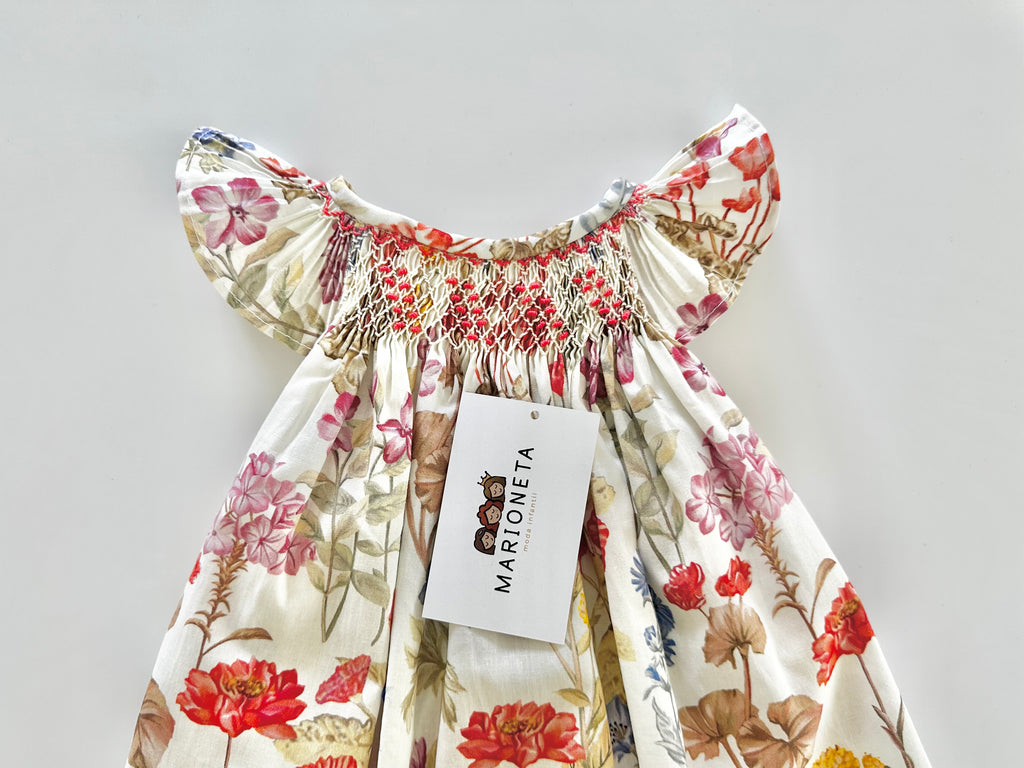 Vestido  jesucito bordado a mano floreado color naranja para niña |