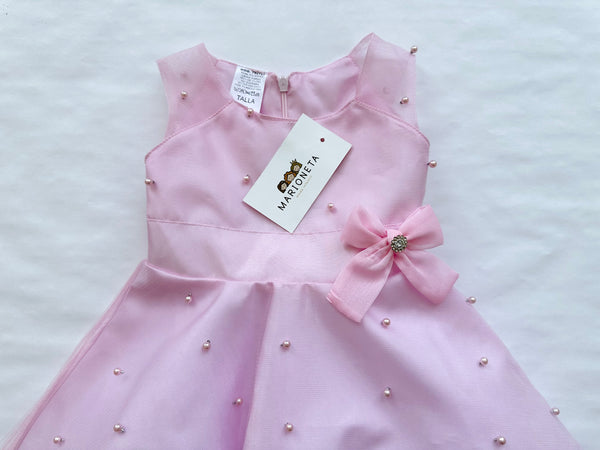 Vestido rosa con adorno de perlas y lazo al frente para niña | MEXICANA