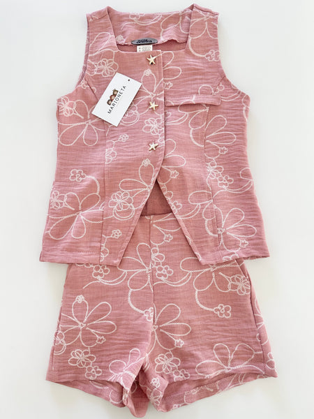 Conjunto dos piezas chaleco y short color rosa con estampado de flores para niña.