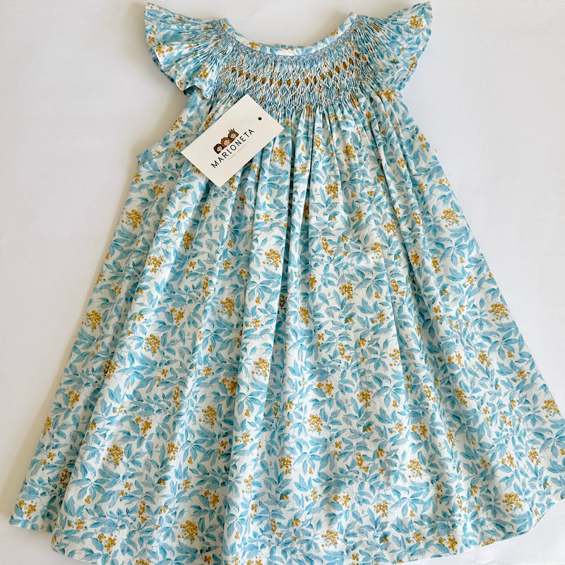 Vestido bordado hecho a mano jesucito color azul con flores y  bordado amarillo para niña | CARPI