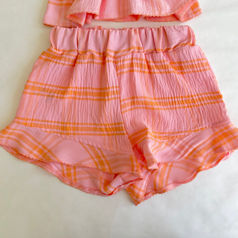 Conjunto dos piezas blusa con resorte color cosa con naranja y short para niña . | mexicano.