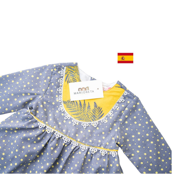 Vestido gris de puntos, combinado con amarillo manga larga para niña |Newness .