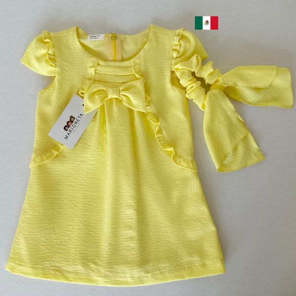 Vestido amarillo con olanes y lazo al frente con adorno para el cabello | Mexcana