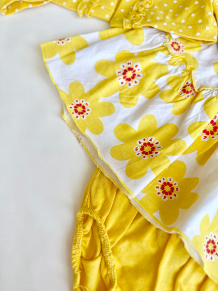 Vestido amarillo estampado de flores con chaqueta y braguita para bebe niña  | sesame