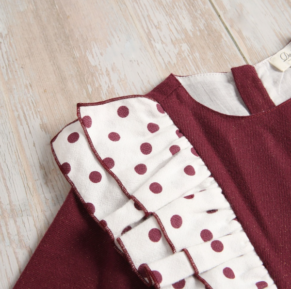 Vestido color tinto con detalles de olanes en blanco con puntos tintos para niña | Dadati