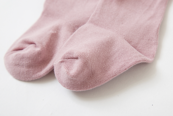 Media color rosa con lazo para bebe niña | Newness