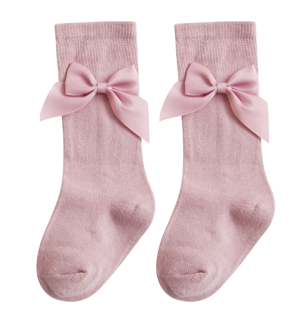 Media color rosa con lazo para bebe niña | Newness