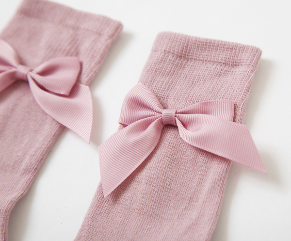 Media color rosa con lazo para bebe niña | Newness
