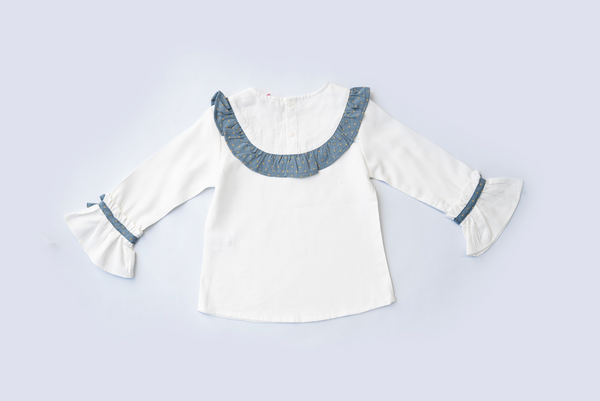 Conjunto dos piezas falda azul con faldon estampado oro y blusa blanca con detalles azules para niña | Newness