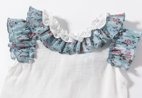 Conjunto de niña blusa blanca con volante estampado y falda estampada azul, para niña | Newness