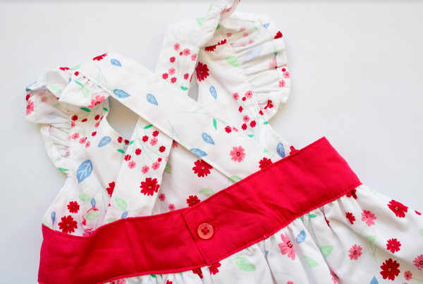 Vestido y braguita color blanco estampado con rosa para bebe niña | Losan